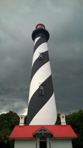 Storm clouds loom ominously over the lighthouse; photo by author